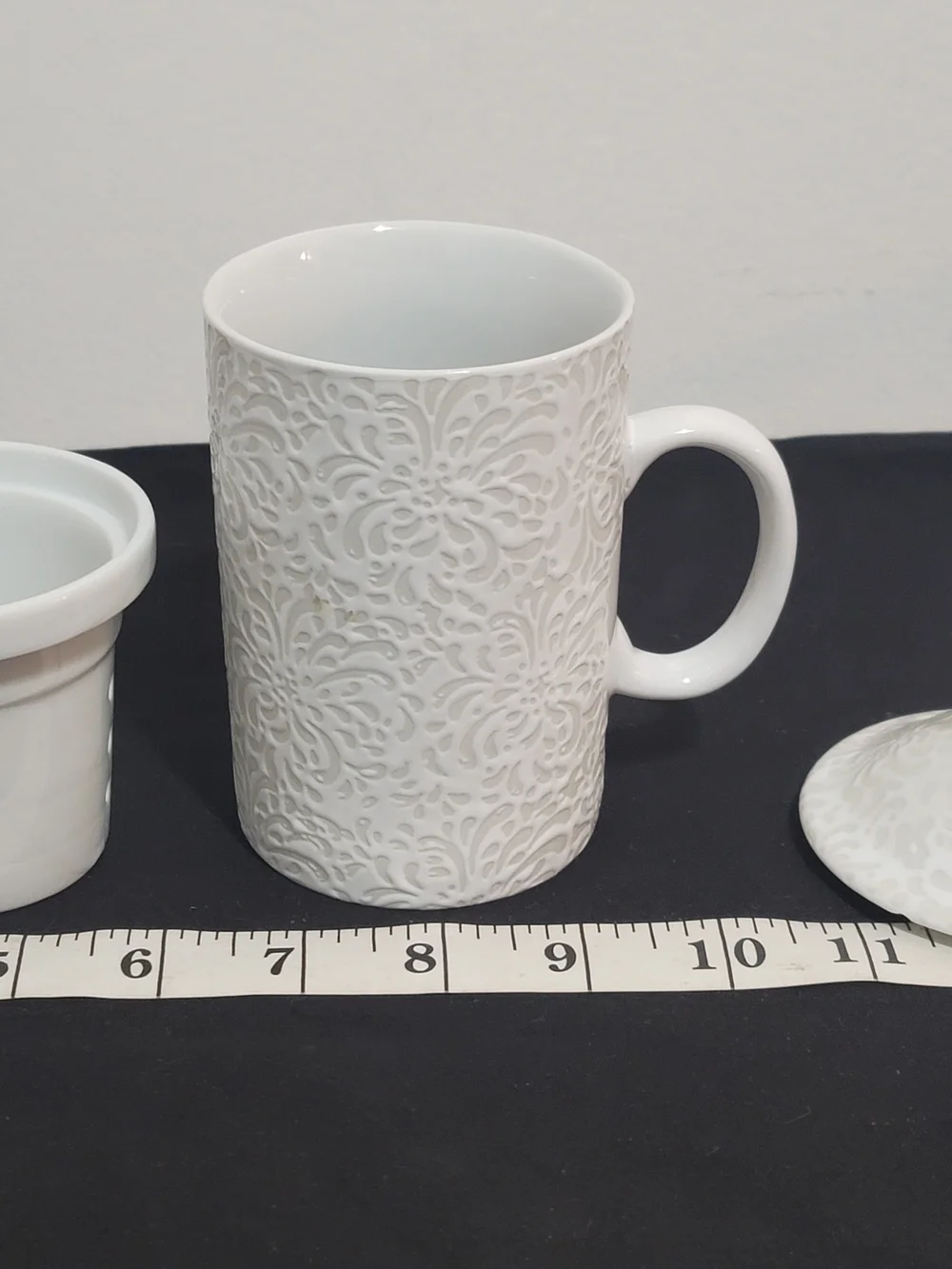 Cost Plus World Market White Embossed Ceramic Tea Strainer Mug with Lid